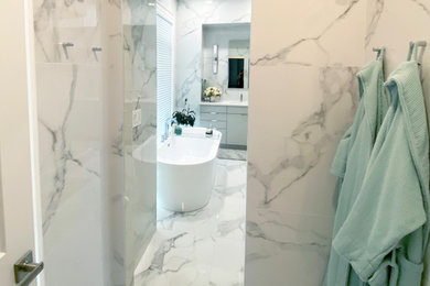 Inspiration for a large contemporary master bathroom remodel in New York