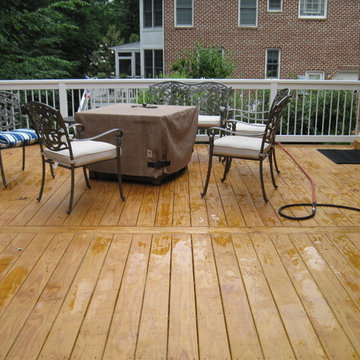 Treated wood deck with clear sealer