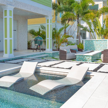 Contemporary Poolside Lounge With Outdoor Kitchen