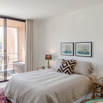 Cozy bedroom with balcony, brass lamps, rattan tables
