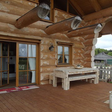 Ökologisches Bauen- Baumstammhaus mit Hofladen