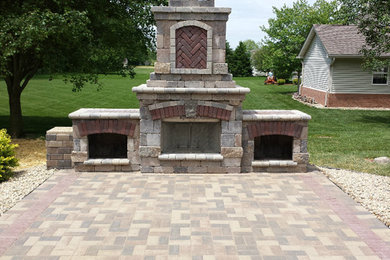 Example of a large backyard patio design in Indianapolis with no cover