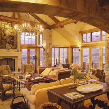 White Fireplace in Stone and Log Living Room