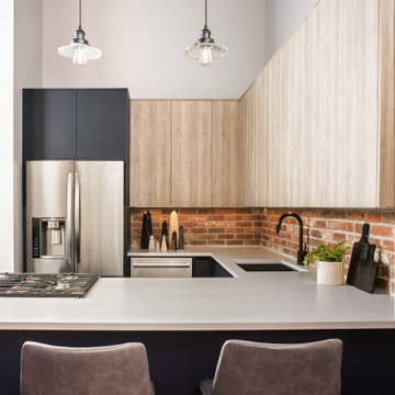 South Loop Loft Kitchen Remodel | Industrial Brick & Timber | Chicago
