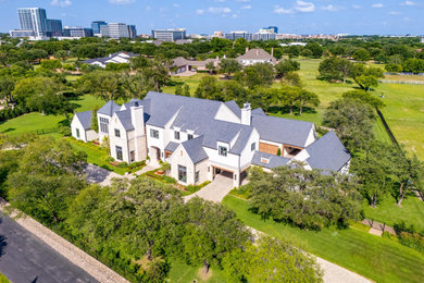 Inspiration for a transitional exterior home remodel in Dallas