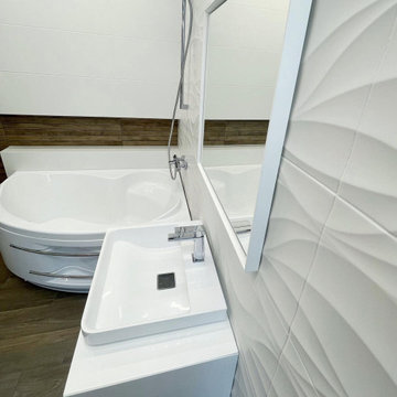 Master Bathroom with white textured and wood-patterned tiles