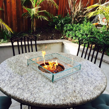 Glass-enclosed fire table