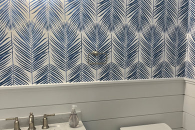Inspiration for a tropical powder room remodel in Philadelphia