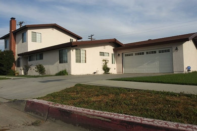 Large two-story exterior home idea in Los Angeles