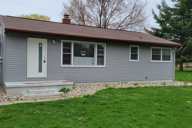 Example of an exterior home design in Other