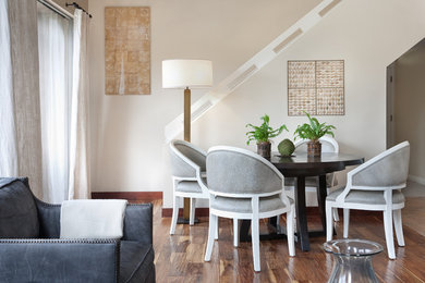 Inspiration for a large transitional medium tone wood floor dining room remodel in Santa Barbara with beige walls