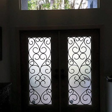 Doors with wrought iron designs