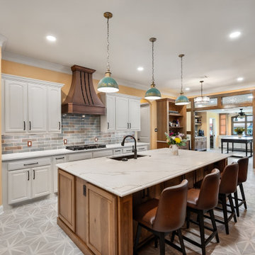Open Concept Kitchen White Quartz Island Leather Barstools Copper Range Hood