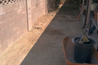 Example of a mid-sized southwest backyard patio design in Other