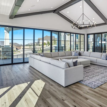 Wraparound Folding Glass Walls Wrap the Living Room in Light and Valley Views