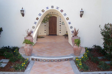 Inspiration for a large coastal white two-story stucco exterior home remodel in San Francisco