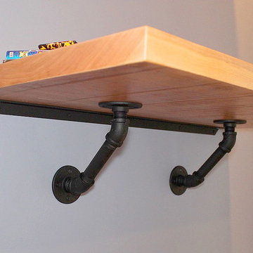 Floating desk with Iron pipe brackets