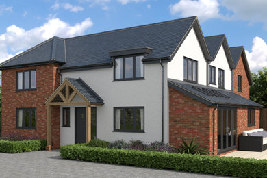 Medium sized modern two floor render and front house exterior in Other with a pitched roof, a tiled roof and a blue roof.
