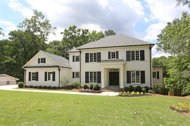Example of a transitional home design design in Atlanta