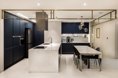 Kitchen - mid-century modern kitchen idea in Other