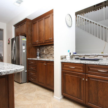 Cherry Kitchen with Modern Mosaic Backsplash
