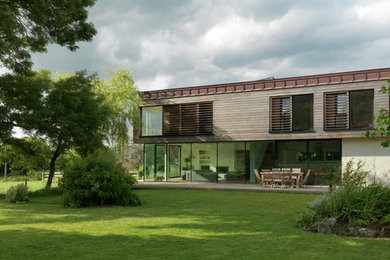 This is an example of a contemporary house exterior in Other.