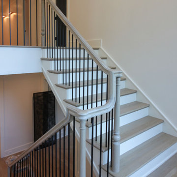 Project #93 | Captivating Staircase with Light Wood and Black Spindles