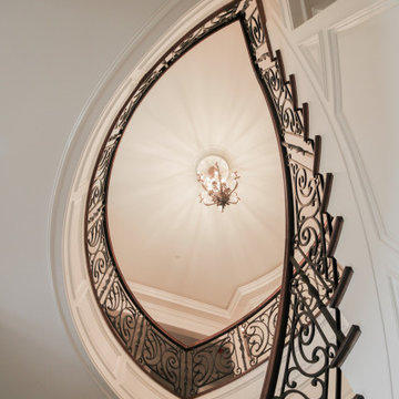 Project #74 | Circular Staircase with Hand-Forged Metal Panels
