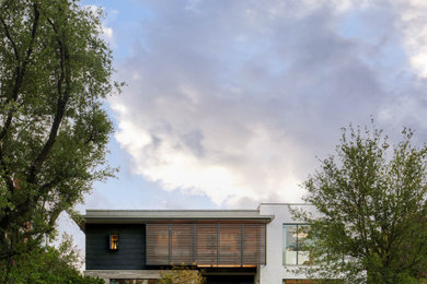 Home design - large modern home design idea in Dallas