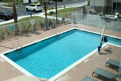 Courtyard rectangular pool photo in Jacksonville