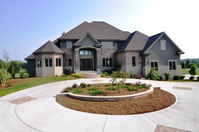Example of a transitional exterior home design in Other