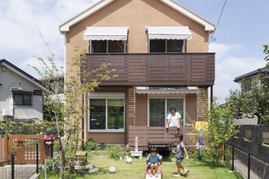 東京都下にあるカントリー風のおしゃれな家の外観の写真