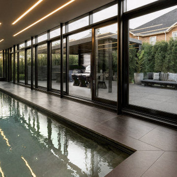 Contemporary Indoor Pool & Landscaping in Saint-Laurent
