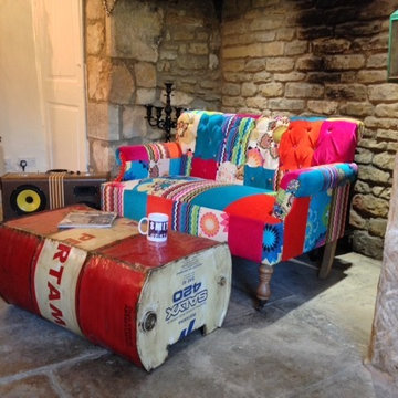 Industrial coffee table and patchwork sofa