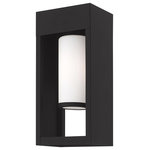 Livex Lighting - Bleecker 1-Light Wall Lantern, Black, 6.25"x13.63" - The box-like solid brass body of this outdoor wall lantern has a thick frame that houses a satin opal white cylinder glass shade. The black finish give the thick, sturdy frame construction a contemporary look with distinct style.