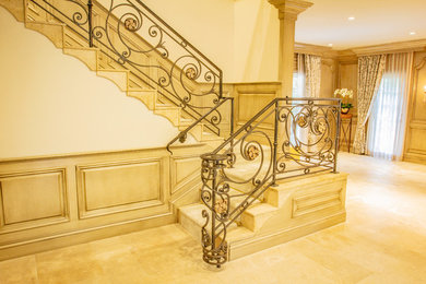 Example of a large classic staircase design in Santa Barbara