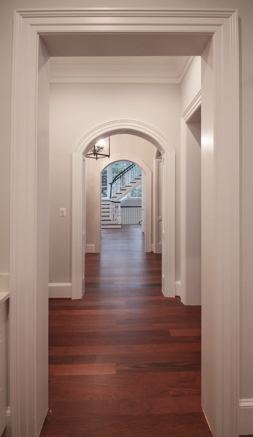Powerful Impression by Floating Staircase in Suburban Foyer