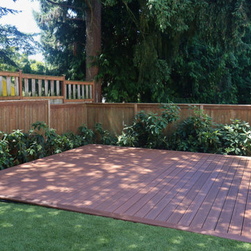 Backyard Composite Deck Among Mature Trees