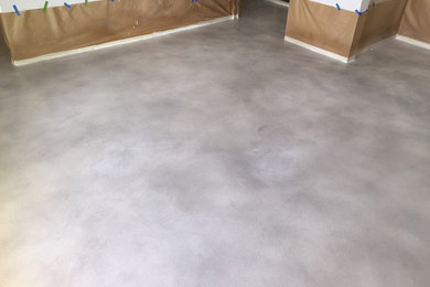 Mid-sized minimalist concrete floor bedroom photo in Phoenix