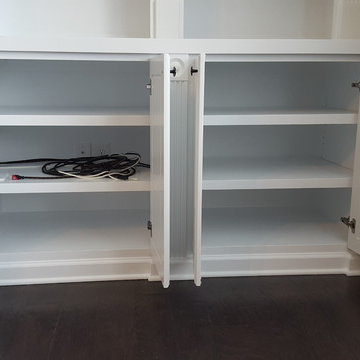Double-Ached Fluted-Trim Fireplace Built-ins
