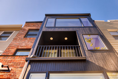 Inspiration for a modern three-story townhouse exterior remodel in New York