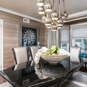 Transitional Dining Room with wallpaper in a neutral color palette