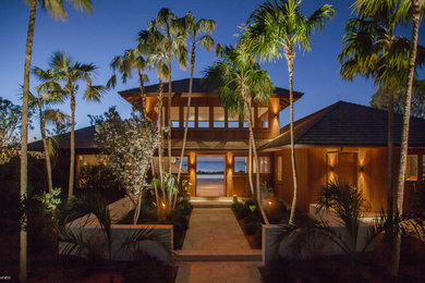 This is an example of an expansive beach style exterior in Other.
