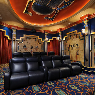 Example of a tuscan enclosed carpeted and multicolored floor home theater design in Houston with multicolored walls