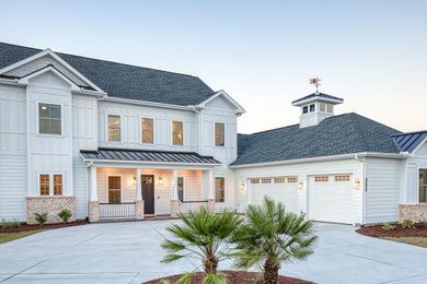 Farmhouse exterior home idea in Other