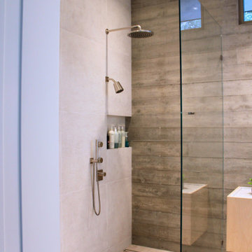Bathroom Entry Sightline with Full-Height Pocket Door and Open Shower