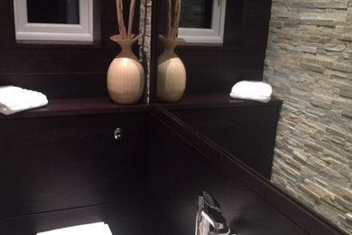 Contemporary powder room in Other.