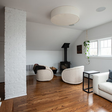 Bungalow Attic Conversion Sitting Area with Freestanding Wood Stove | Arlington
