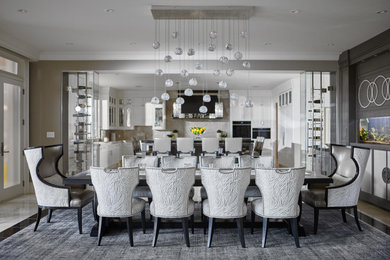 Kitchen/dining room combo - large transitional porcelain tile and multicolored floor kitchen/dining room combo idea in Toronto with gray walls