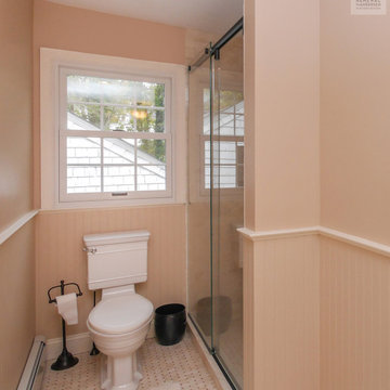 Charming Bathroom with New White Window - Renewal by Andersen Long Island
